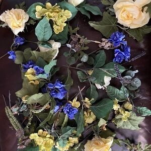 Floral Arrangement with Yellow and Blue Accents